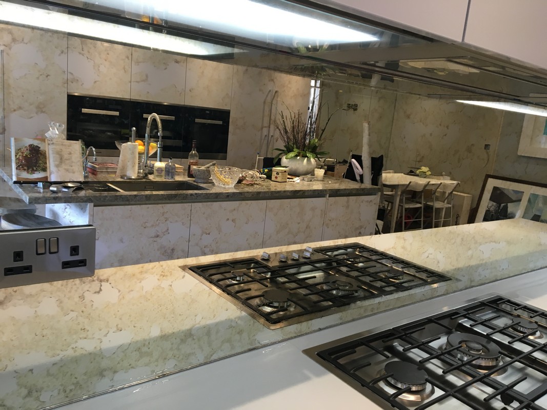 Mirror glass splashback in Streatham luxury kitchen